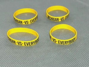 Michigan Football "Michigan vs Everybody" Silicone Wristbands - Lot of 4Y - Picture 1 of 4