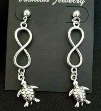 Silver tone infinity turtle post earrings