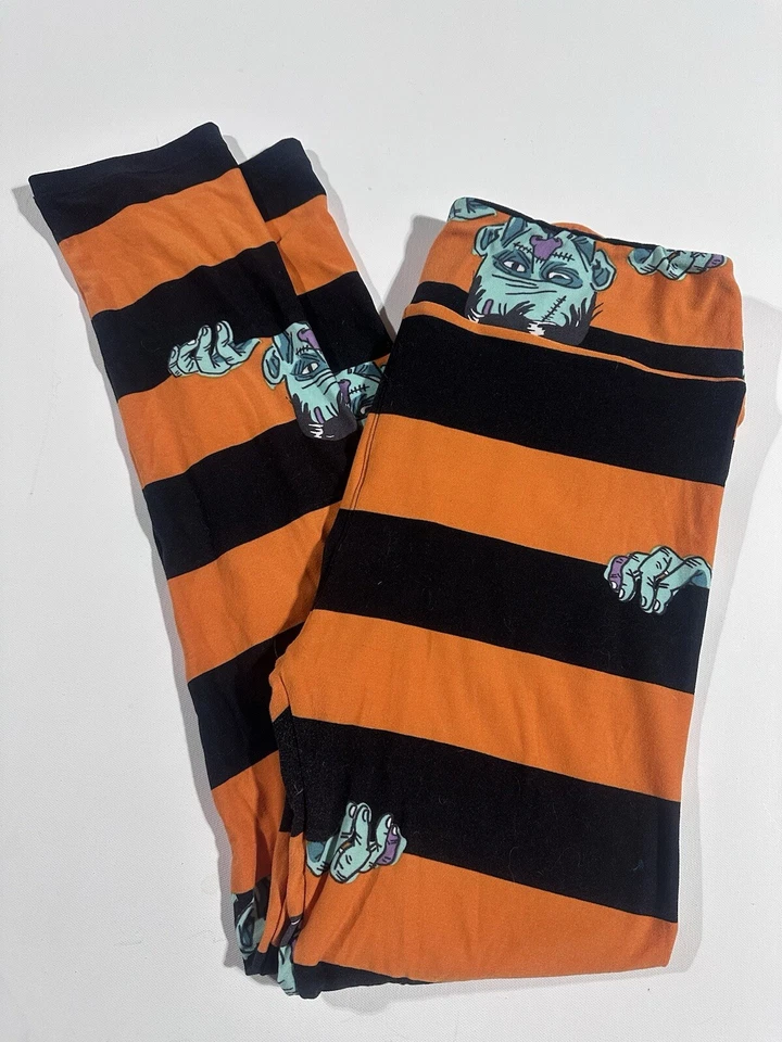 Leggings LuLaRoe TC2 em excelente estado usado listra preta laranja FRANKENSTEIN Monster HALLOWEEN - Imagem 1 de 4