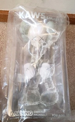 Figura Vinilo KAWS Small Lie Companion Marrón Nueva pero Dañada Foto 1 de 4