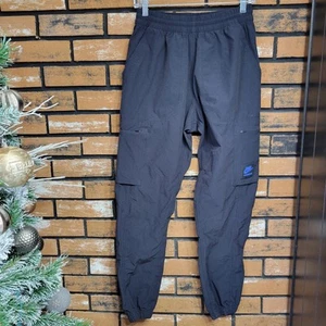 Nike Track Pants Mens Medium Woven Cargo Air Max Black Tapered Elastic Waist - Picture 1 of 14