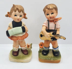 Ceramic Boy & Girl Playing Musical Instruments - Picture 1 of 1