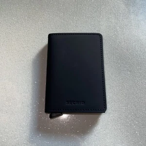 Secrid SM Slim Wallet Matte Black NEW Genuine Leather RFID Safe Card And Cash 🔥 - Picture 1 of 7