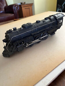 Lionel O-27 Gauge Locomotive with Whistle Tender and other rolling stock.