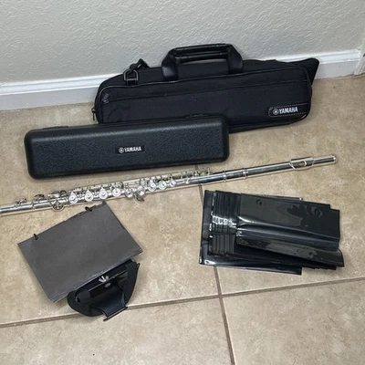 Yamaha Flute With 2 Cases, a Flip Folder, and 10 Extra Flip Folder Sheets - Image 1 of 4