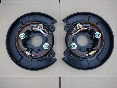 Placas de respaldo de freno de disco Camry 86-99 Toyota Celica 87-01 OEM Foto 1 de 4