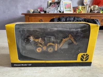 MEZZO DA LAVORO STRADALE NEW HOLLAND ESCAVATORE GOMMATO 1:87 NUOVO DA COLLEZIONE - Immagine 1 di 4