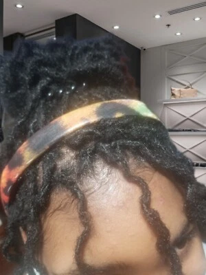 Diadema elástica de cuero sintético de diseñador con estampado de animales Foto 1 de 2