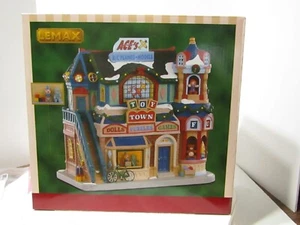 Lemax Christmas Village - 2020 TOY TOWN Ace's RC Planes-Models #05653 New In Box - Picture 1 of 7