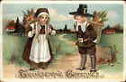 Thanksgiving Pilgrim Girl and Boy With Baskets of Food Vintage Postcard