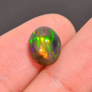 1.7 Ct Natural Black Ethiopian Opal Oval Shape Cabs Loose Gemstone 9X7X4 mm - Picture 1 of 5
