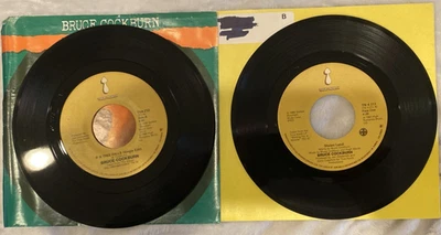 Lot 2 Bruce Cockburn 45RPM  If A Tree Falls/Stolen Land N-Mint Vinyl - Image 1 of 4