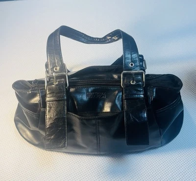 Cartera de mano de cuero negra para mujer KENNETH COLE Reaction Foto 1 de 4