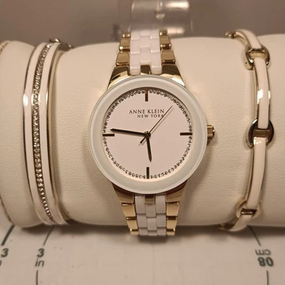 Nuevo reloj pulsera y pulseras Anne Klein para mujer dorado blanco batería nueva sin usar  Foto 1 de 4