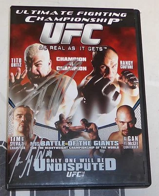 Autógrafo campeón indiscutible firmado por Tito Ortiz y Tim Sylvia UFC 44 2003 DVD MMA Foto 1 de 4