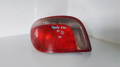 TOYOTA ECHO LEFT TAILLIGHT NCP10R, HATCH, LENS# 52-004, 10/99-09/02 99 00 01 02 - image 1 of 3