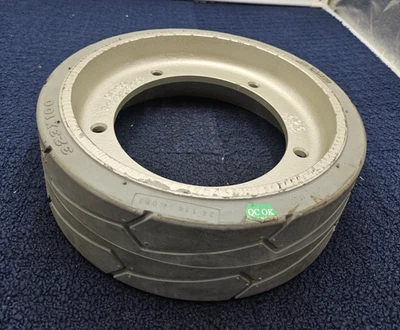 Camso 94012810 Solid Non-Marking Ribbed Tire 5 Bolt 323x100 For Scissor Forklift - Image 1 of 4