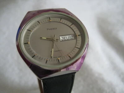 NOS NEW SWISS MADE AUTOMATIC WATER RESIST MEN'S PHENIX WATCH 1960'S DAY AND DATE - Image 1 of 3