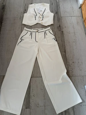 ¡Pantalones únicos con chaleco para mujer talla grande! Foto 1 de 4