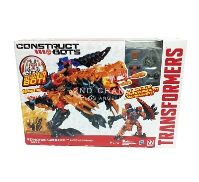 New 2013 Hasbro Transformers Construct Bots Dinofire Grimlock & Optimus Prime - Image 1 of 4