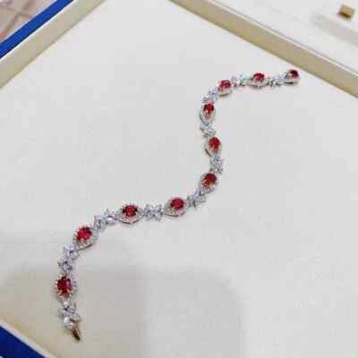 Brazalete tenis mujer 7"" corte ovalado simulado rubí rojo 6 quilates chapado en oro blanco 14K Foto 1 de 4