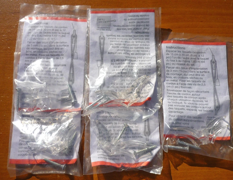 CANTIDAD de (10) tacos de cable transparente de seguridad para niños con tornillos de montaje - Hunter Douglas Foto 1 de 2