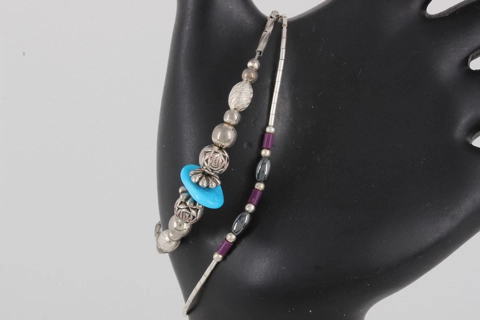 JUEGO DE 2 PULSERAS 1 CUENTAS TURQUESA Y PLATA 1 CUENTAS HEMATITA Y MORADO 1935 Foto 1 de 2