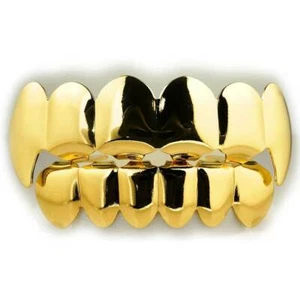 Parrilla de acero inoxidable superior e inferior GRILLZ chapada en oro 18K colmillo vampiro Hip Hop - Imagen 1 de 4