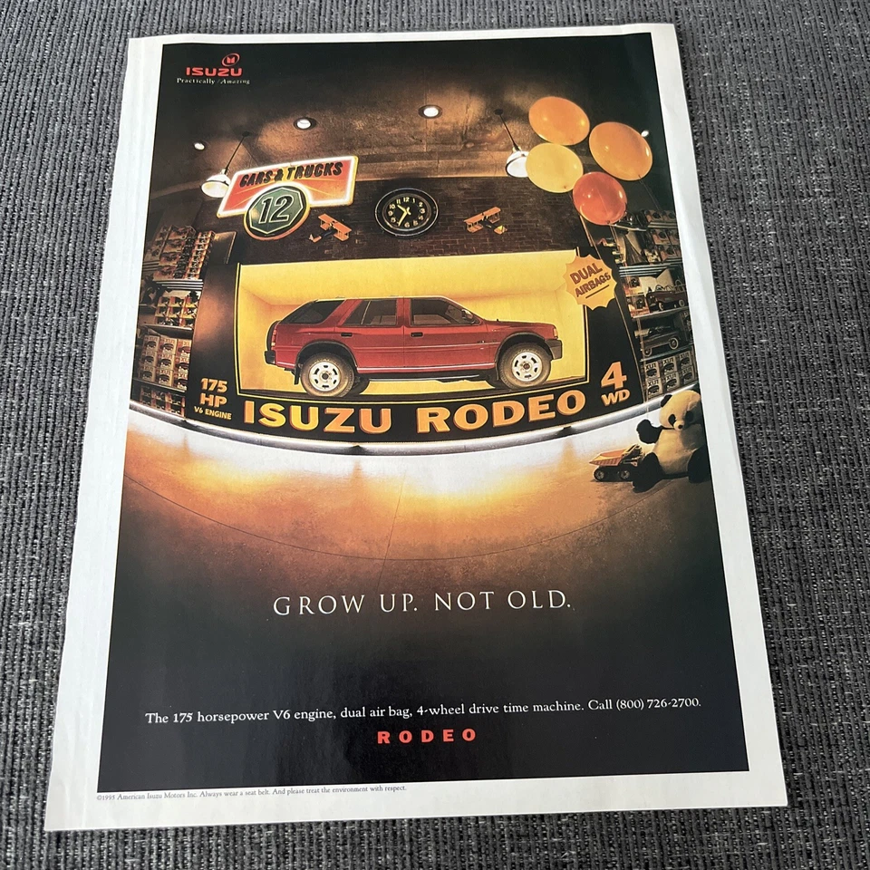 Isuzu Rodeo 1995 revista vintage anuncio impreso crecer no viejo rojo SUV en tienda de juguetes Foto 1 de 1
