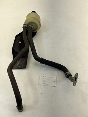 Nissan NV 1500-3500 2012-2020 botella de depósito de líquido de dirección asistida OEM. Foto 1 de 4