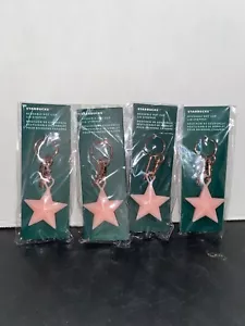 Lot of x4 Starbucks 2023 Holiday Pink Christmas Star Reusable Hot Lid Stopper - Picture 1 of 4