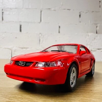 Welly 1999 Ford Mustang Red Opening Doors 49753 1:32 Pullback Car - Image 1 of 4