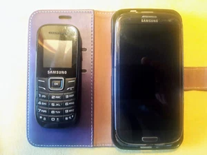 Smartphone Samsung Galaxy S3 Neo GT-I9301I Android + Handy Samsung GT-E1200 - Bild 1 von 3
