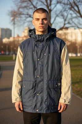 Chaqueta grande de lluvia con capucha forrada Reebok vintage de los 90 para hombre necesita tirar de cremallera Foto 1 de 4