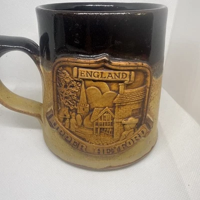 UPPER HEYFORD ENGLAND COFFEE MUG. EMBOSSED ENGLAND POTTERY MUG - Image 1 of 4