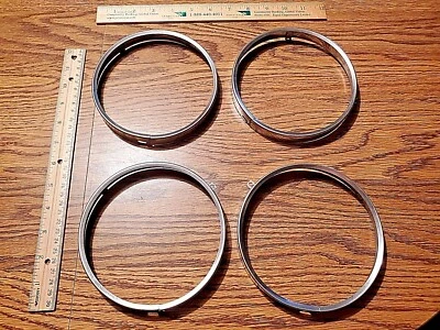 Lote de 4 anillos de ajuste Oldsmobile 442 Cutlass 1965 retenedor faros OEM ORIGINAL Foto 1 de 4