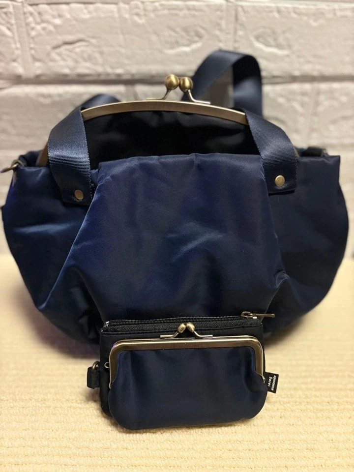 Monedero azul marino con Foto 1 de 4