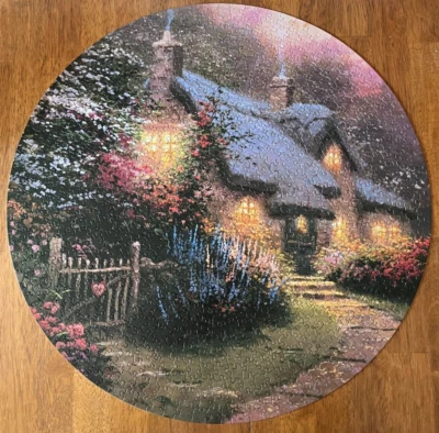 Ceaco 24" circular jigsaw puzzle, 750 pc. Thomas Kinkade, "Glory of Evening" - Image 1 of 3