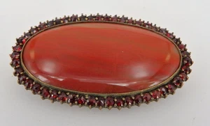 Ovale Brosche großer Achat im Rahmen mit zahlreichen Granate um 1920 (130486) - Bild 1 von 6