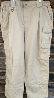 Pantalones tácticos utilitarios Propper para hombre caqui usados talla 46W 37L Foto 1 de 4