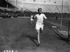 Douglas Lowe winning 1/2 mile during Oxford & Cambridge against Ya - 1923 Photo