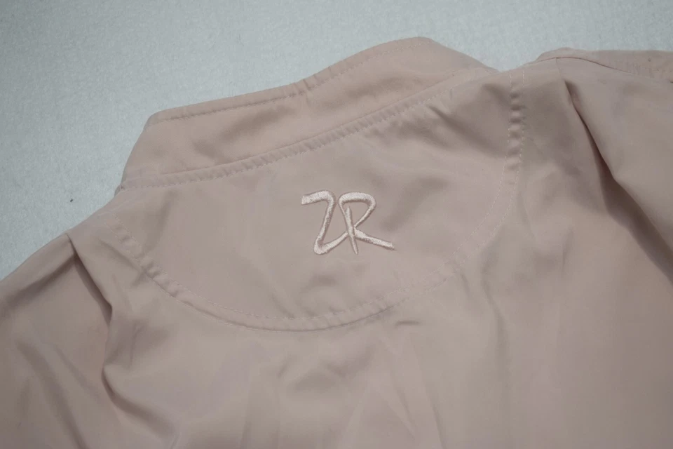 Chaqueta de golf de microfibra Zero Restriction cuello a presión pulóver rosa para mujer mediana Foto 1 de 4