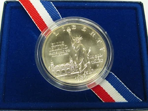 1986-P United States Mint Uncirculated Silver Dollar + OGP & COA - Picture 1 of 3