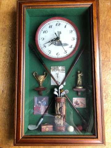 The History of Golf - shadow box framed in wood with glass front and clock Cover