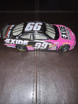 Ford Taurus Diecast 1997 NASCAR RACING CHAMPIONS #99 EXIDE JEFF BURTON 1:24 de colección Foto 1 de 4