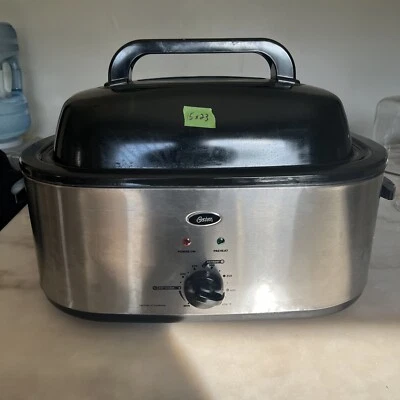 Horno tostador Oster CKSTRS20-SBHVR 20 qt con tapa auto-bastante Foto 1 de 4