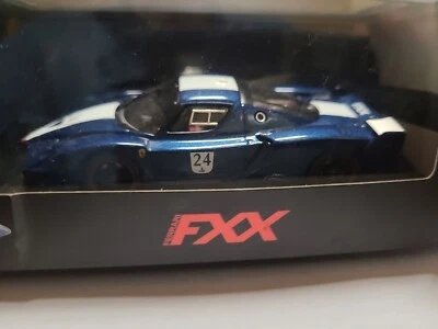 LE6384 HOT WHEELS ELITE N5606 voiture 1/43 Ferrari FFX bleue EDL - Photo 1/4