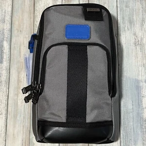 NWT Tumi FIFE Slim Sling Bag Light Gray Blue - Picture 1 of 6