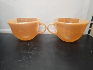 2- Vintage Fire King Oven Ware Coffee Tea Cups Peach Lustre Wheat Laural Leaves - Picture 1 of 9