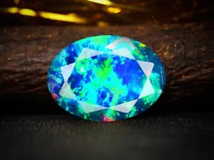 Opale nero naturale etiope sfaccettato ovale 3,30 ct opale di fuoco arcobalen... - Foto 1 di 7